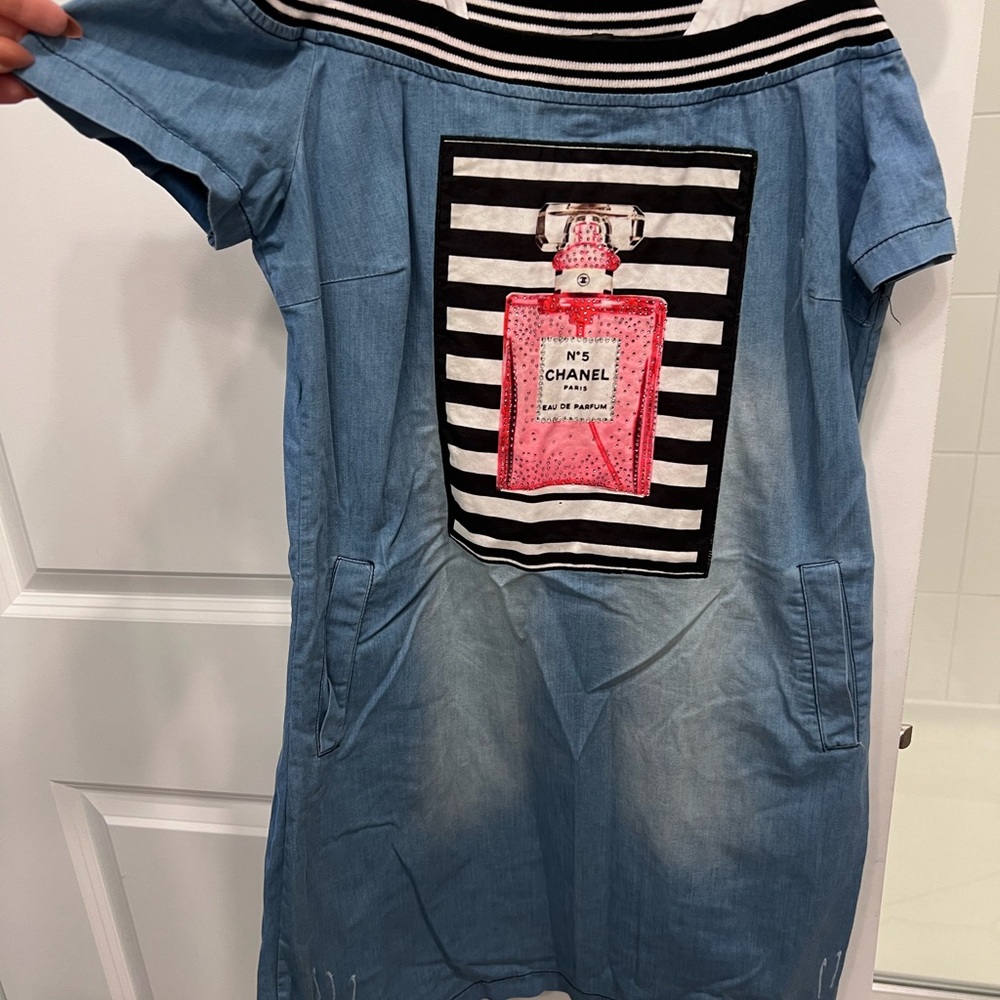 Blue Dress with Pink Perfume Bottle Design